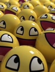 картинка Множество весёлых смайликов - Множество различных круглых и смешных смайлов, которые символизируют радость и смех., для мобильного телефона