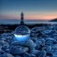 стеклянный шар на берегу на телефон